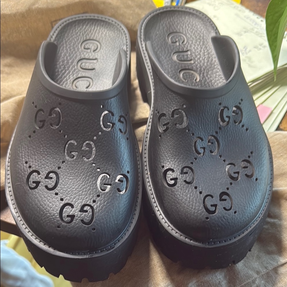 Gucci Black Leather Slippers with Signature GG Design